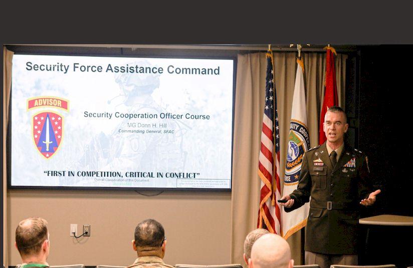 Major General Donn H. Hill speaking with DSCU students 